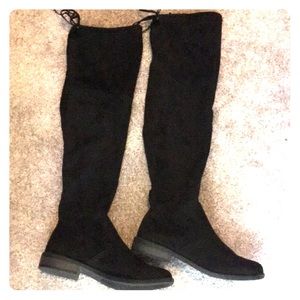 Black faux suede knee high boots.
